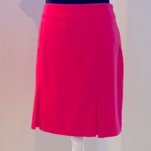 Greg Norman Rose colored pleated golf skort. Size 12
